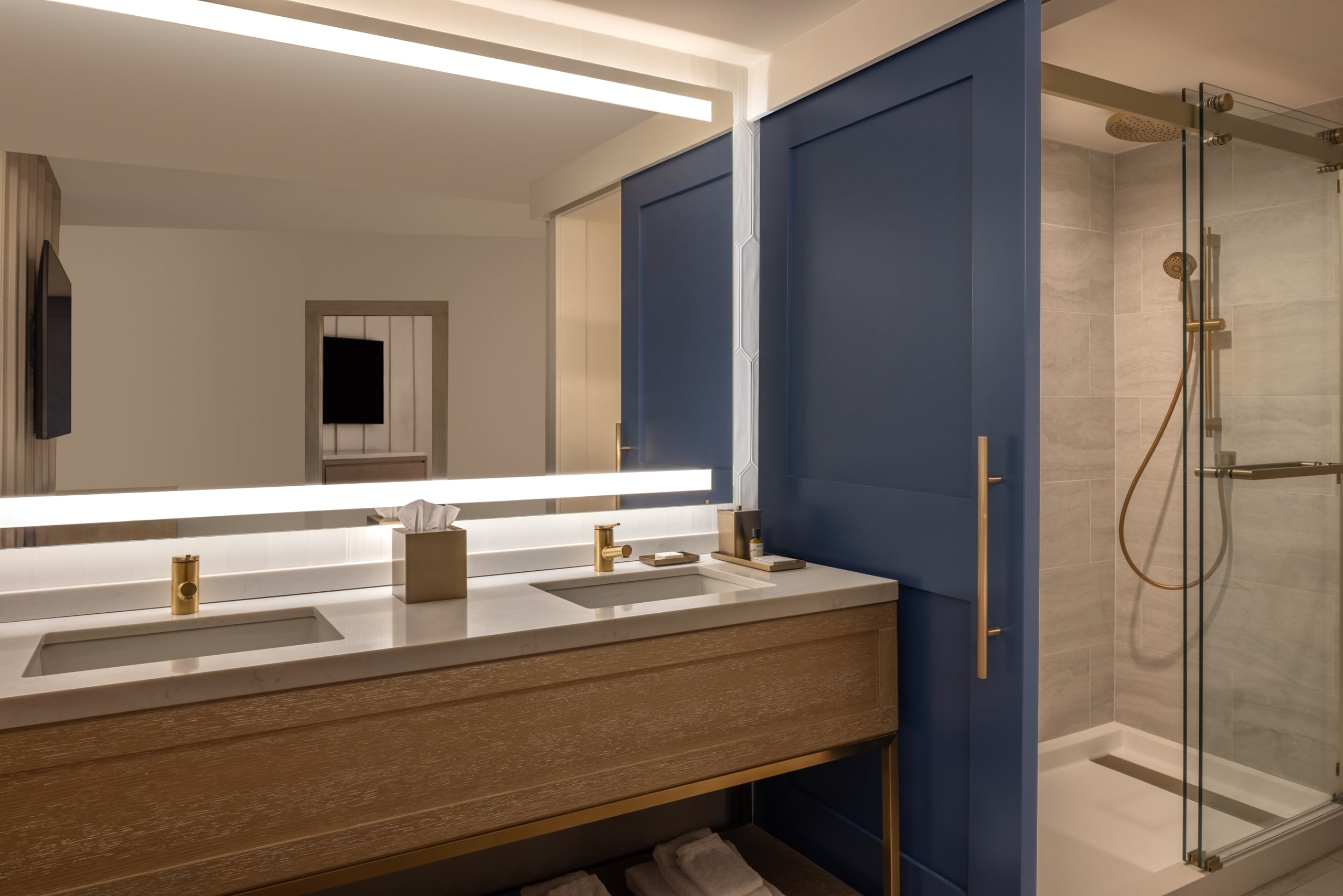 Bathroom with double vanity and stand up shower