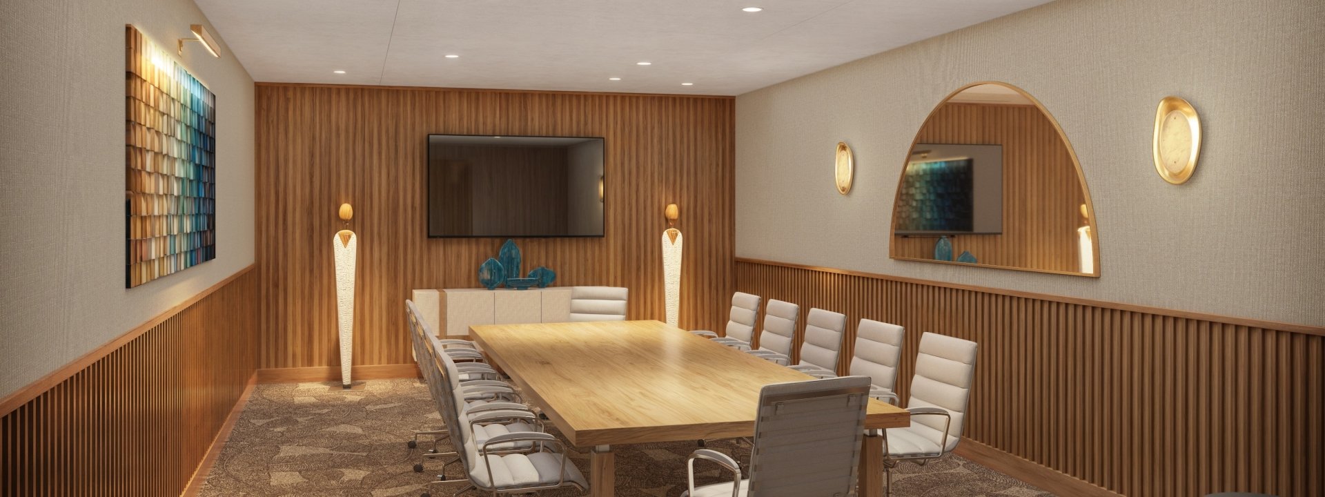 A large wooden desk with comfortable chairs for meeting at The Sunny