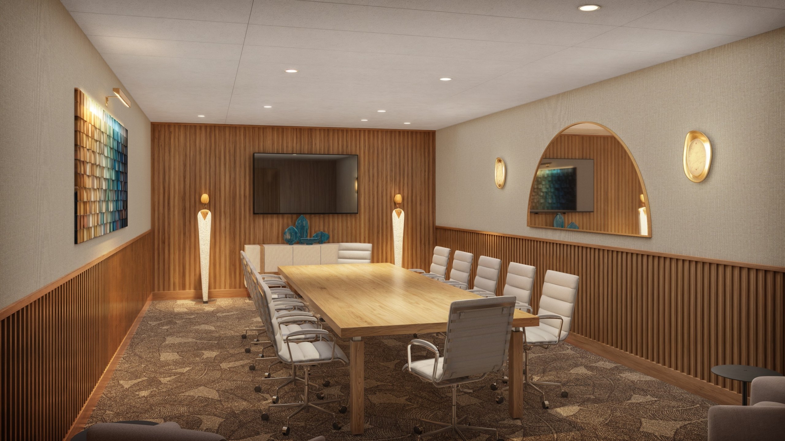 A large wooden desk with comfortable chairs for meeting at The Sunny