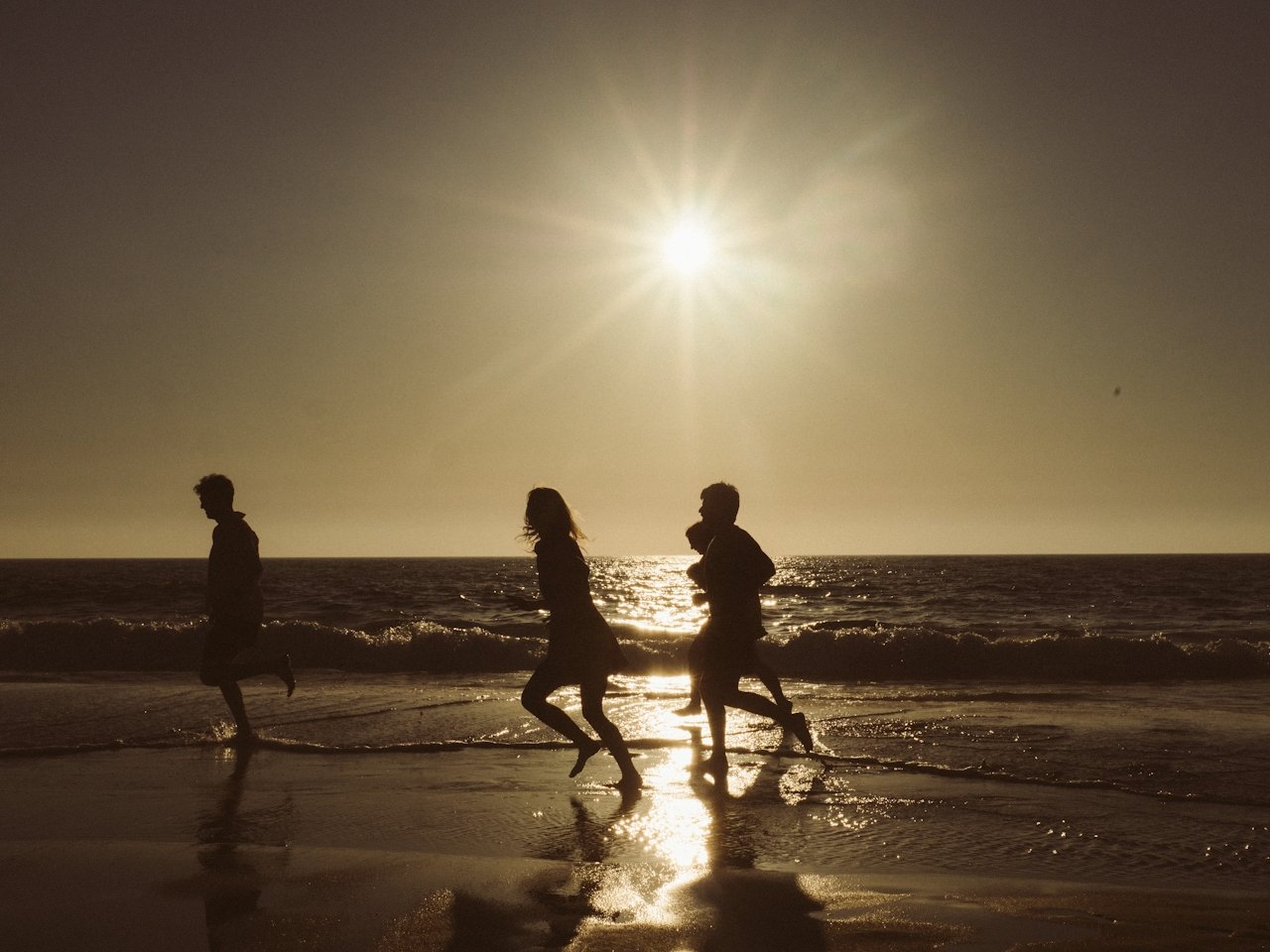 People running on Miami beach
