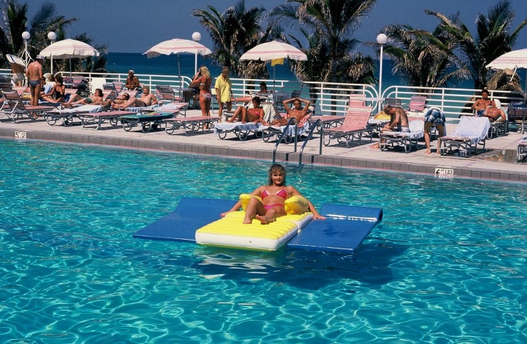 A woman with tub in outdoor swimming pool at Newport