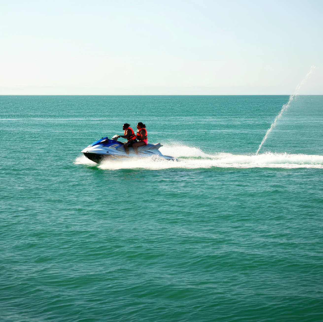 Two people on a jetski