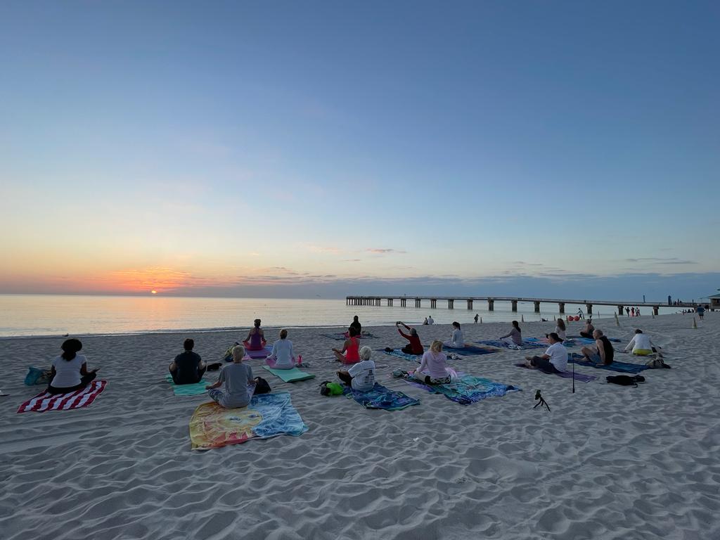 Sunrise Yoga on the beach The Sunny Athletics Claudia Vasconcelos