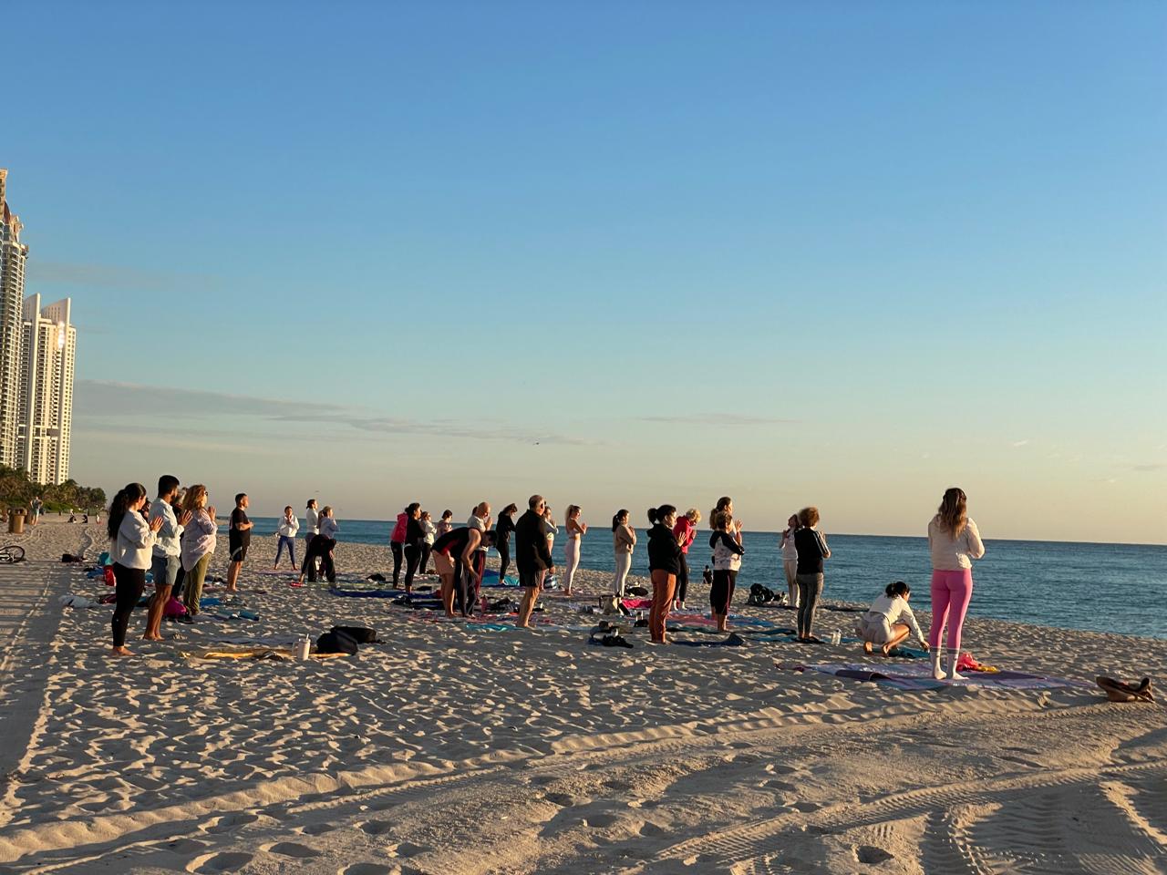 Sunrise Yoga on the beach The Sunny Athletics Claudia Vasconcelos